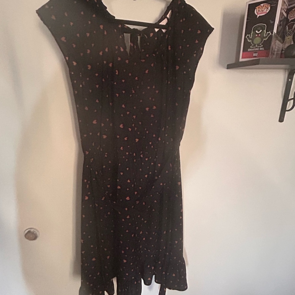 Elegant Black Dress with Red Accents
